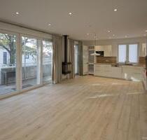 Elegante Dachgeschosswohnung mit umlaufender Dachterrasse in zentraler Lage von Wildeshausen