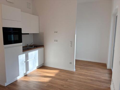 Foto - Neubau Erstbezug 1-Zimmer-Wohnung mit Einbauküche und Terrasse im EG