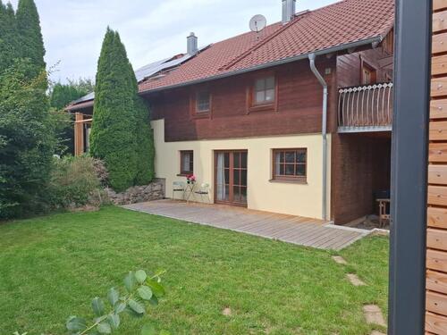 Foto - Erdgeschosswohnung mit Garten & Terrasse in Holzhaus