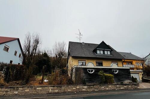 Foto - Einfamilienhaus mit Einliegerwohnung und großen Garten