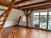 Foto - Großzügige 4-Zimmer-Wohnung mit Loft und Holzbalkendecken