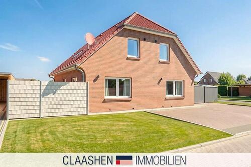 Foto - Gehobene Erdgeschosswohnung im 2-Parteien-Haus