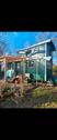 Foto - Tiny Haus auf Rändern großer Schäferwagen mit einem Dachgeschoss