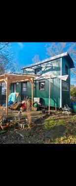 Foto - Tiny Haus auf Rändern großer Schäferwagen mit einem Dachgeschoss