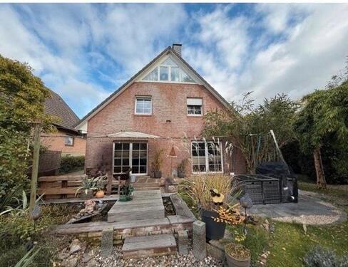 Foto - Einfamilienhaus mit großem Grundstück