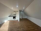 Foto - Mietwohnung - modernisierte 2 Zimmer-Dachgeschosswohnung