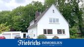 Foto - Attraktive 3-Zimmer-Obergeschosswohnung in einem Zweifamilienhaus auf eingegrüntem Grundstück