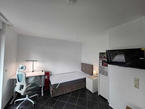 Foto - Möblierte 1-Zimmer-Whg. mit Terrasse & TG-Stellplatz im Rodgebiet