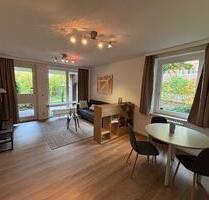 Möbliertes 1,5-Zimmer-Apartment mit Terrasse, Gartennutzung & TG - Wedel