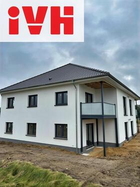 Foto - Erstbezug ab 01.12: Moderne Erdgeschosswohnung mit Terrasse und Garten