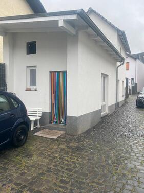 Foto - Haus mit Anbau und eine ScheuneWerkstatt