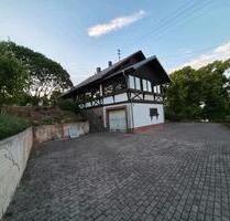 Großzügiges Einfamilienhaus mit vermieteter Einliegerwohnung - Ruschberg