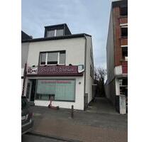 Wohn- und geschäftshaus mit Garagen in Duisburg Buchholz