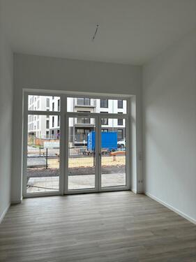 Foto - Helle 2-Zimmer-Wohnung mit Terrasse und Stellplatz