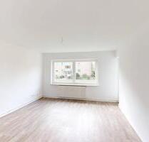 Lichtdurchflutete 3-Zimmer-Erdgeschosswohnung mit BALKON, EBK und Wannenbad - Uetersen