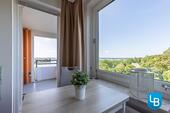 Foto - Stilvolle möblierte 2,5-Zimmer-Mietwohnung mit Balkon und Seeblick in Plön
