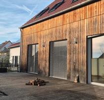 Vollhollzhaus mit Lärchenverschalung - Büchenbach