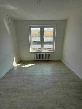 Foto - Mehrfamilienhaus mit Ladenlokal