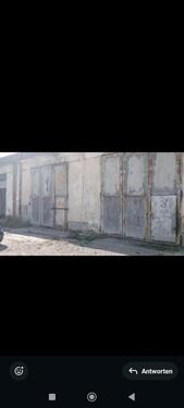 Foto - LKW garage lagerhalle mit Strom