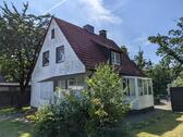 Foto - Einfamilienhaus mit Garage und Garten