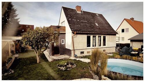 Foto - + + EINFAMILIENHAUS + WEIDENGRUND IN SCHMÖLLN + RUHIGE LAGE + +