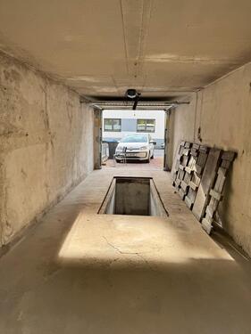 Foto - Große Garage mit Grube und Strom in Langenfeld Zentrum