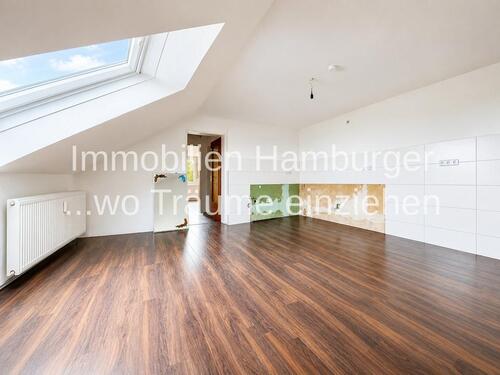 Foto - Wohnen unterm Dach: Helle 3-Zimmer-Wohnung mit Charme