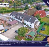 Moderne 3-Zimmer-Wohnung mit Einbauküche, Garten und Balkon in Syke