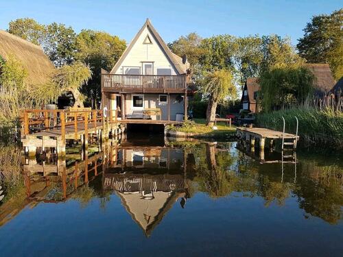 Foto - Ferienhaus direkt am See in Mecklenburg mit Boot Sauna Privatsteg
