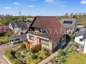 Foto - Einfamilienhaus mit Einliegerwohnung – über 220 m² Wohn-Nutzfl.