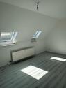 Foto - 3 Zimmer Dachgeschoßwohnung in Langgöns