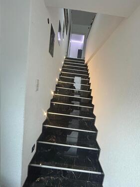 Foto - Elegante 4 Zimmer Wohnung mit eigenen Garten und Pool.