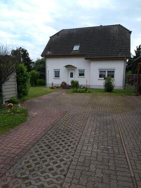 Foto - Einfamilienhaus mit Einliegerwohnung im Landhausstil