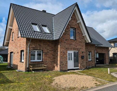 Foto - Einfamilienhaus mit optionaler Einliegerwohnung.