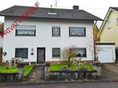 Foto - Einfamilienhaus mit E-Wohnung, großem Grundstück u.1 Garage