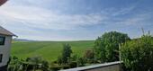 Foto - Vermiete schöne 90 m² Wohnung in Mudershausen – direkt am Feld