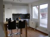 Foto - Exklusives 2. Zimmer Appartment, vollmöbliert mit TG-Stellplatz