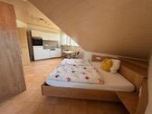 Foto - Möblierte 1‑Zimmer-Dachgeschosswohnung