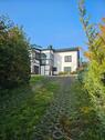 Foto - Haus mit Wintergarten mit Wiese für Herz & Seele