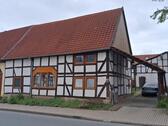 Foto - Mietshaus mit Garten und Carport