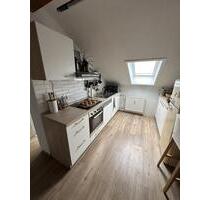 Charmante Dachgeschosswohnung mit Balkon in Münster (Hessen)