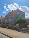 Foto - Einfamilienhaus mit Garten und Nebengelass