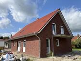 Foto - Neubau Obergeschosswohnung mit Balkon in Moormerland- Warsingsfehn!