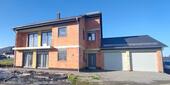 Foto - Großzügiges Mehrfamilienhaus mit Doppelgarage und Garten
