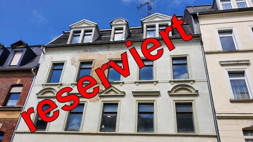 Foto - reserviert - Mehrfamilienhaus mit Südhang-Garten
