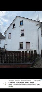Foto - Wohnhaus mit Garage und Lagerflächen