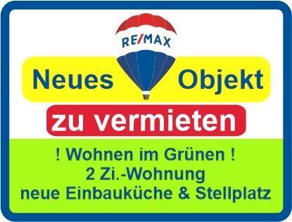 Foto - Seltenheit! Wohnen im Grünen! helle, neuwertige 2 Zi.-Wohnung mit moderner Einbauküche und Stellpl.!