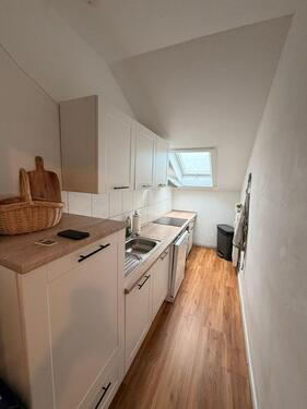 Foto - Helle 3-Zimmer Dachgeschosswohnung mit Einbauküche