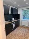 Foto - Helle und modernisierte 3 Zimmer Eigentumswohnung mit Souterrain