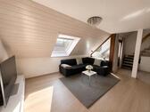 Foto - Helle Maisonette-Wohnung mit Loggia & Tiefgaragenstellplatz